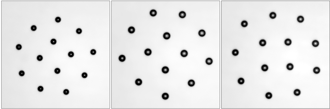 Images of small clusters of water droplets: (d—f) at c_av = 0.4%, where (d) is t = 0 s, (e) is t = 90 s, and (f) is t = 290 s